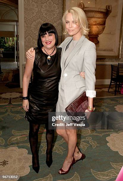 Author/V-Day Founder Eve Ensler and actor Charlize Theron attend V-Day's 4th Annual LA Luncheon featuring a reading of Eve Ensler's newest work "I Am...