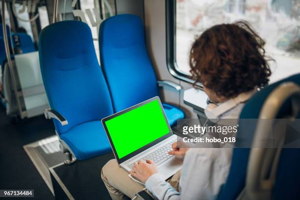 businessman using laptop - green screen copy space - chroma key stock pictures, royalty-free photos & images