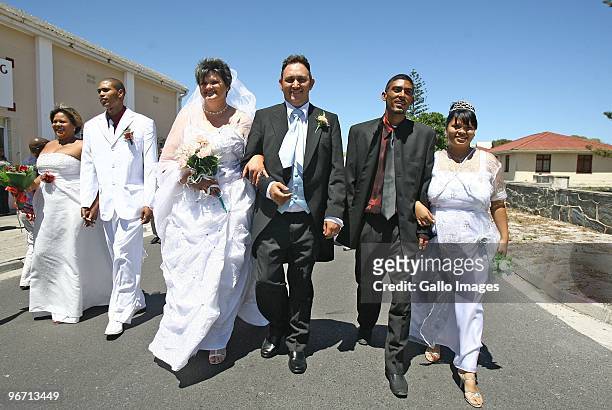 Couples attend a Robben Island wedding ceremony on Valentines Day on February 14, 2010 in Robben Island near Cape Town, South Africa. Robben Island...