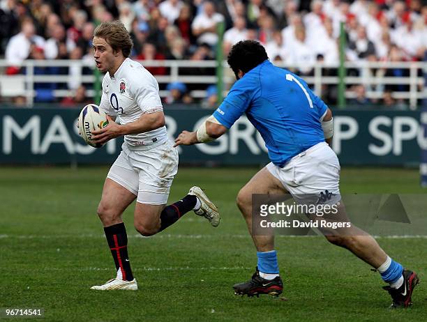 Mathew Tait of England moves away from Salvatore Perugini during the RBS Six Nations match between Italy and England at Stadio Flaminio on February...