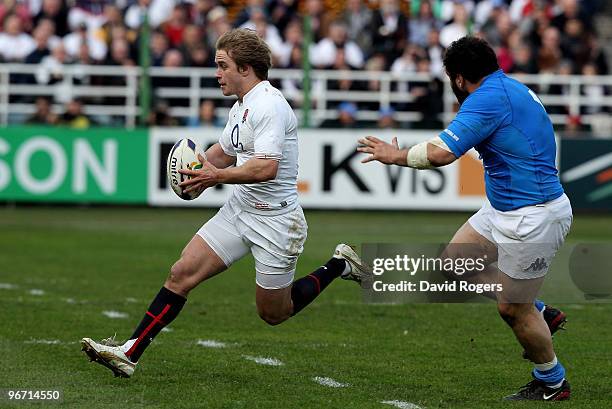 Mathew Tait of England moves away from Salvatore Perugini during the RBS Six Nations match between Italy and England at Stadio Flaminio on February...