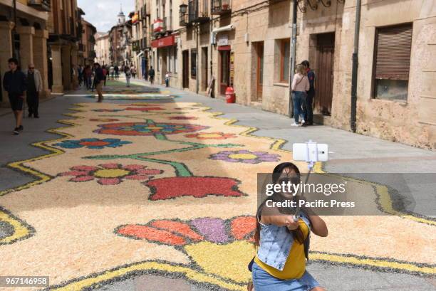 Woman takes a selfie during the Corpus Christi feast in 'El Burgo de Osma', north of Spain.