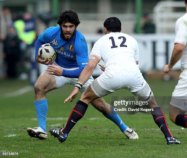 Luke McLean of Italy takes on Riki Flutey during the RBS Six Nations match between Italy and England at Stadio Flaminio on February 14, 2010 in Rome,...