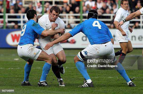 Mark Cueto of England is tackled by TitoTebaldi and Quintin Geldenhuys during the RBS Six Nations match between Italy and England at Stadio Flaminio...