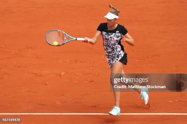 Elise Mertens of Belgium plays a forehand during the ladies singles fourth round match against Simona Halep of Romania during day nine of the 2018...