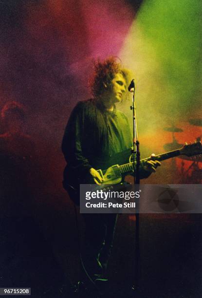 Robert Smith of The Cure performs on stage at Wembley Arena, on July 23rd, 1989 in London, United Kingdom.