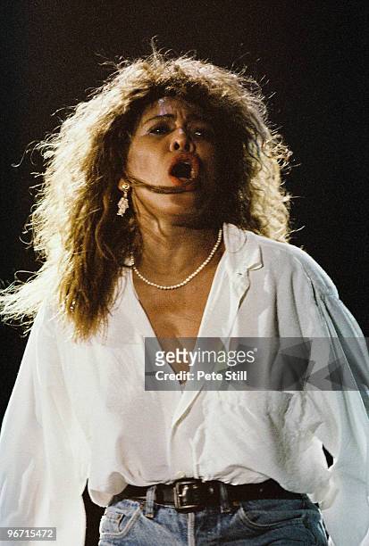 Tina Turner performs on stage on her 'Foreign Affair' tour, at Woburn Abbey on July 29th, 1990 in Woburn, United Kingdom.