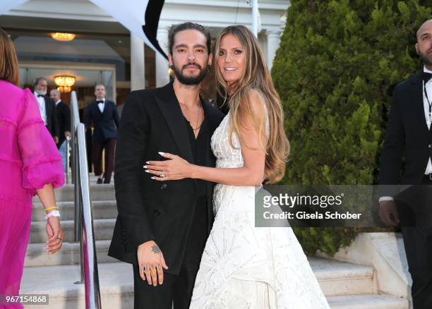 Heidi Klum and her boyfriend Tom Kaulitz arrive at the amfAR Gala Cannes 2018 at Hotel du Cap-Eden-Roc on May 17, 2018 in Cap d'Antibes, France.