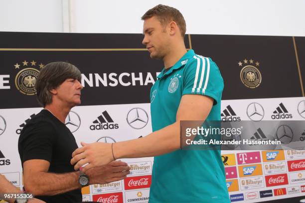 Manuel Neuer arrives with Joachim Loew, head coach of the German national team for a press conference with of the German national team at Sportanlage...