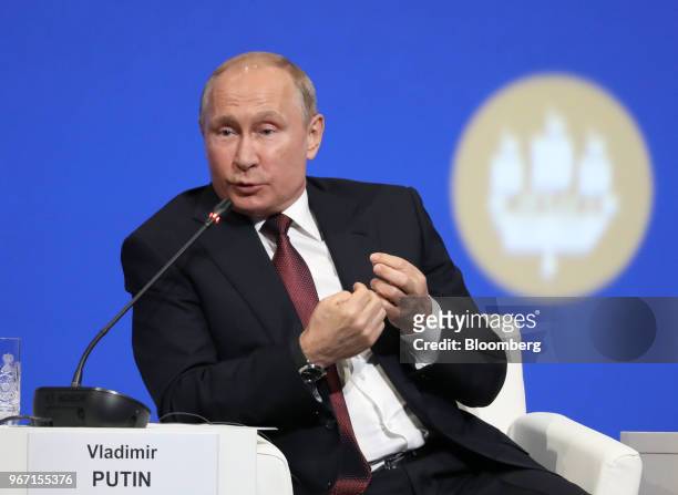 Vladimir Putin, Russia's president, gestures as he speaks during the plenary session at the St. Petersburg International Economic Forum in St....