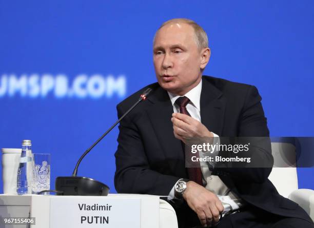 Vladimir Putin, Russia's president, gestures as he speaks during the plenary session at the St. Petersburg International Economic Forum in St....