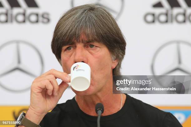 Joachim Loew, head coach of the German national team enjoys a espresso during a press conference of the German national team at Sportanlage Rungg on...