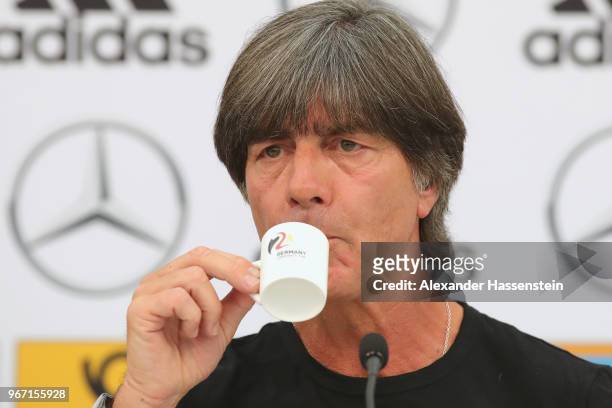Joachim Loew, head coach of the German national team enjoys a espresso during a press conference of the German national team at Sportanlage Rungg on...