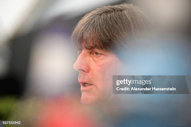 Joachim Loew, head coach of the German national team talks to the media during a press conference of the German national team at Sportanlage Rungg on...