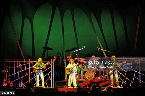 Steve Howe, Jon Anderson, Alan White, and Chris Squire of Yes perform on stage on their 'Going For The One' tour at Wembley Arena, on October 28th,...