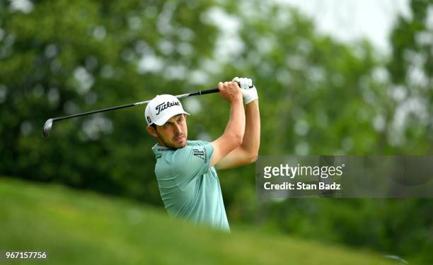 Patrick Cantlay plays a tee shot on the third hole during the final round of the Memorial Tournament presented by Nationwide at Muirfield Village...