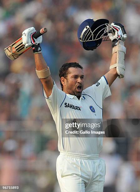 Sachin Tendulkar of India celebrates his 47th test hundred during day two of the Second Test match between India and South Africa at Eden Gardens on...