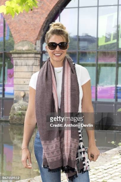 Gemma Atkinson from The Hits Radio poses outside the studio as she celebrates the airing of her first show with Gethin Jones and Dave Vitty on June...