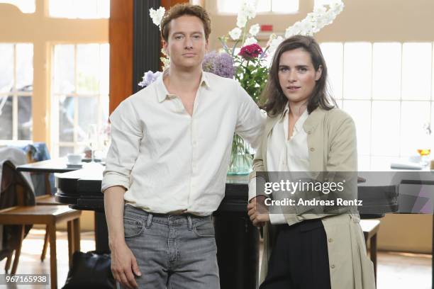 Alexander Fehling and Nora Tschirner pose during 'Gut gegen Nordwind' on set photocall on June 4, 2018 in Cologne, Germany.