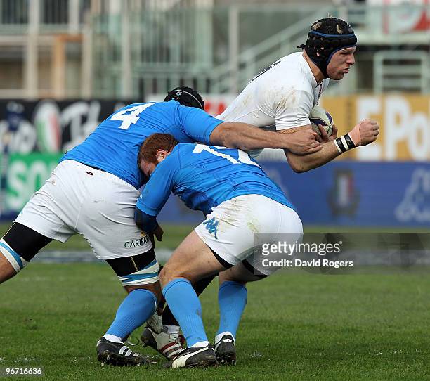 James Haskell of England is tackled by Quintin Geldenhuys and Gonzalo Garcia during the RBS Six Nations match between Italy and England at Stadio...