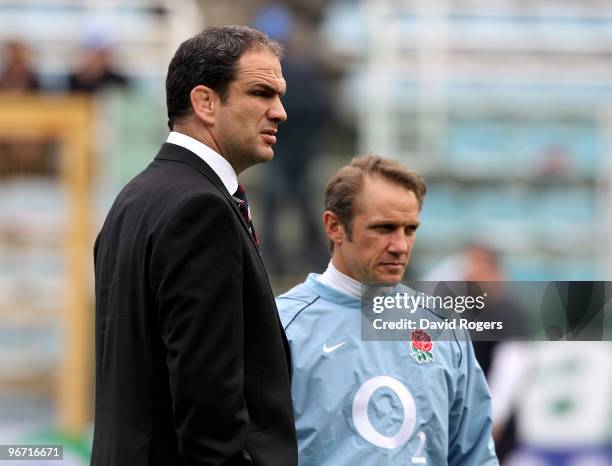 Martin Johnson , the England head coach and his backs coach Brian Smith look on during the RBS Six Nations match between Italy and England at Stadio...