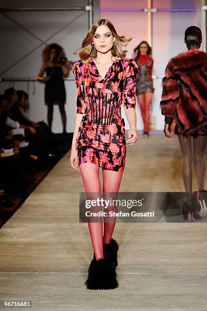 Model walks the runway at the Zac Posen Fall 2010 Fashion Show during Mercedes-Benz Fashion Week at the Altman Building on February 15, 2010 in New...