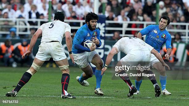 Luke McLean, the Italy fullback is tackled by Steve Thompson during the RBS Six Nations match between Italy and England at Stadio Flaminio on...
