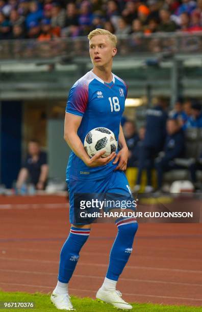 Iceland's defender Hordur Bjorgvin Magnusson holds the ball during the international friendly football match Iceland v Norway in Reykjavik, Iceland...