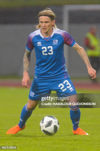 Iceland's defender Ari Skulason controls the ball during the international friendly football match Iceland v Norway in Reykjavik, Iceland on June 2,...