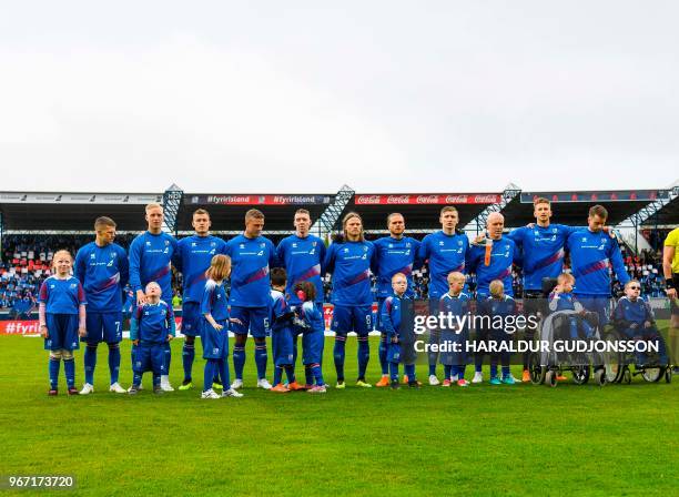 Iceland's team players pose for a photo prior to the international friendly football match Iceland v Norway in Reykjavik, Iceland on June 2, 2018.