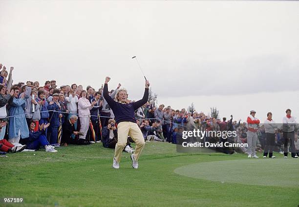 Bernhard Langer of the European team celebrates after sinking a putt during the Saturday afternoon foursomes against the USA pairing of Lanny Wadkins...