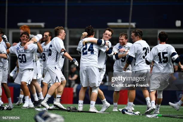 Yale University celebrates their victory over Duke University during the Division I Men's Lacrosse Championship Semifinals held at Gillette Stadium...