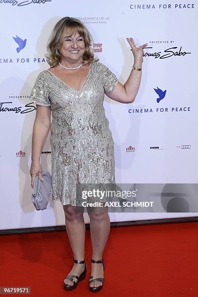 Actor Leonardo DiCaprio's mother, Irmelin Indenbirken-DiCaprio waves as she arrives at the "Cinema for Peace" charity gala in Berlin on February 15,...