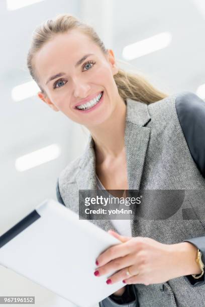 cute manager working with joy - yoh4nn stock pictures, royalty-free photos & images