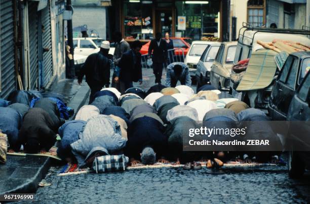 Muslim prayers at the Barbes Goutte D'Or area in Paris, June 22, 1991.