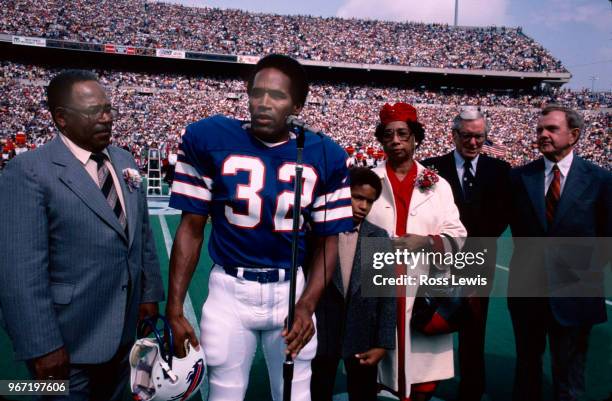 Simpson, professional football player with the Buffalo Bills, is inducted into the Wall of Fame in Rich Stadium on September 14, 1980. Simpson is...