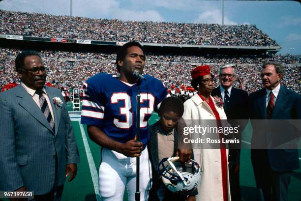 Simpson, professional football player with the Buffalo Bills, is inducted into the Wall of Fame in Rich Stadium on September 14, 1980. Simpson is...