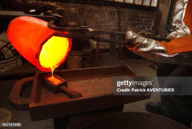 Gold jewelry purchased by the company Gold By Gold are prepared to be melted at 1000 degr?es,and transformed into gold bullion,on June 26, 2012 in...