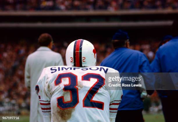 Simpson sitting on the bench during an NFL football game between the Buffalo Bills and New York Jets at Shea Stadium, November 12, 1972. Simpson ran...