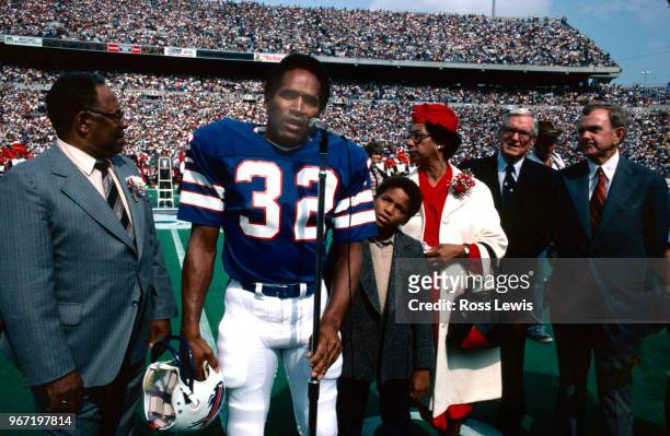 Simpson, professional football player with the Buffalo Bills, is inducted into the Wall of Fame in Rich Stadium on September 14, 1980. Simpson is...