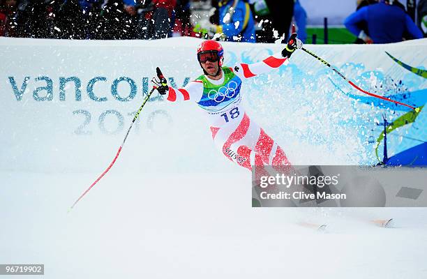 Didier Defago of Switzerland reacts after competing in the Alpine skiing Men's Downhill at Whistler Creekside during the Vancouver 2010 Winter...