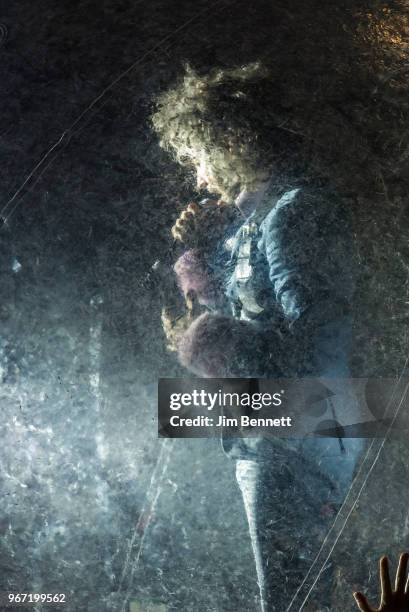 Singer and guitarist Wayne Coyne of The Flaming Lips performs live inside an inflatable ball during Upstream Music Festival at Pioneer Square on June...