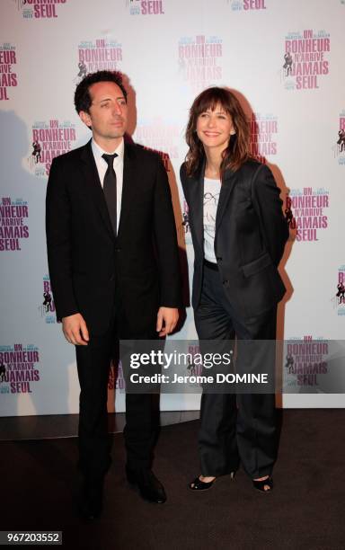 Gad Elmaleh and Sophie Marceau attending the premiere of 'Un bonheur n'arrive jamais seul' held at Cinema Gaumont Marignan on June 15, 2012 in Paris,...