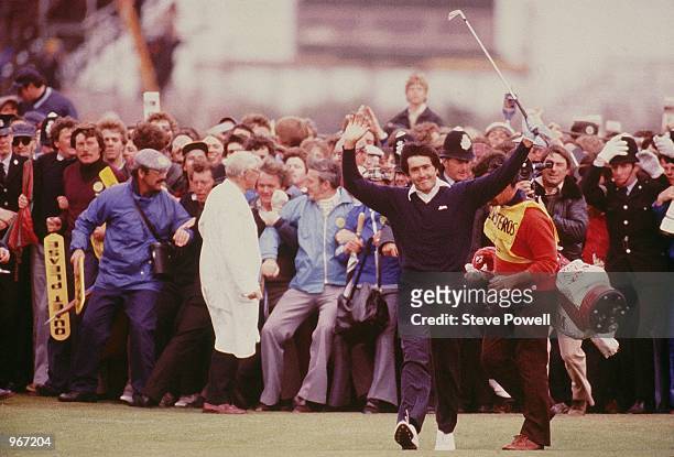 Seve Ballesteros of Spain celebrates on the 18th fairway on his way to victory in the British Open at Royal Lytham St Annes in Lancashire, England. \...