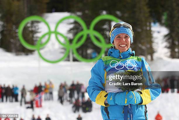 Charlotte Kalla of Sweden wins the gold medal in the Cross-Country Skiing Ladies' 10 km Free on day 4 of the 2010 Winter Olympics at Whistler Olympic...