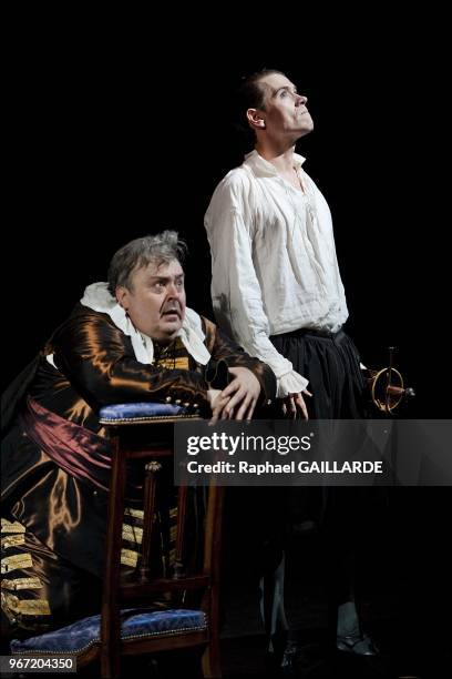 Loic Corbery and Serge Bagdassarian from The Comedie Francaise troupe perform "Dom Juan ou le Festin de Pierre" of Moliere on September 14, 2012 in...