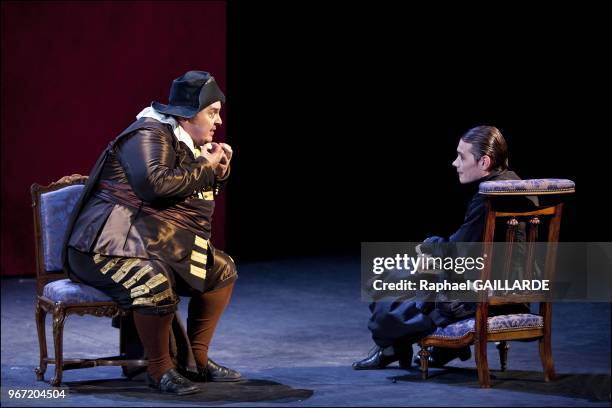 Loic Corbery and Serge Bagdassarian from The Comedie Francaise troupe perform "Dom Juan ou le Festin de Pierre" of Moliere on September 14, 2012 in...