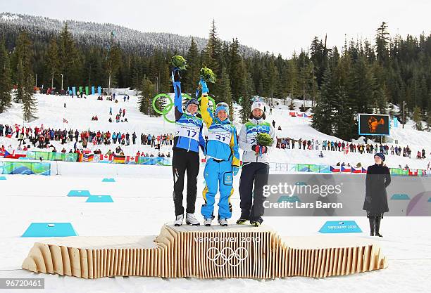 Kristina Smigun-Vaehi of Estonia wins the silver medal, Charlotte Kalla of Sweden wins the gold medal and Marit Bjoergen of Norway wins the bronze...