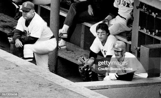 Boston Red Sox manager Don Zimmer and players Carlton Fisk and Rick Burleson in the dugout during a game against the New York Yankees at Fenway Park...