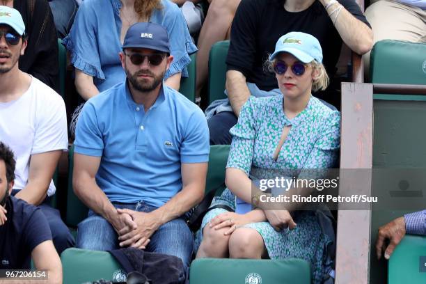 Alysson Paradis and actor Guillaume Gouix attend the 2018 French Open - Day Nine at Roland Garros on June 4, 2018 in Paris, France.